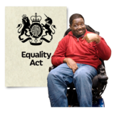 A person sitting in a wheelchair smiling, next to an image of the Equality Act.