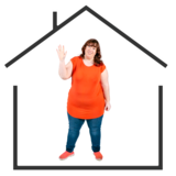 A person standing inside an outline of a house.