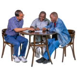 Three people sitting talking at a table.