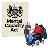 A person standing next to a person using a wheelchair. There is an image of the Mental Capacity Act behind them.